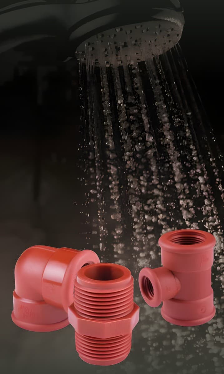 PP threaded elbow, nipple, and tee under a hot shower
